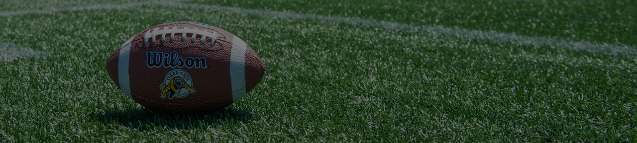 Football on the Turf at Football Stadium.png
