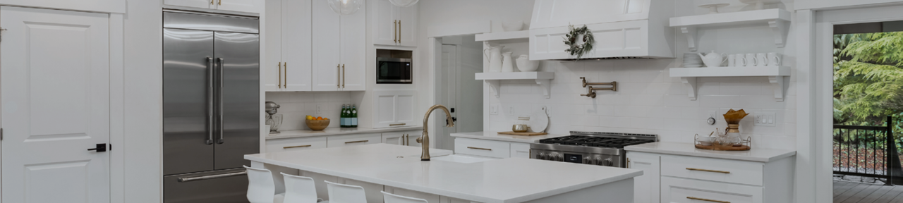 Kitchen with White Cabinets and Stainless Steel Appliances