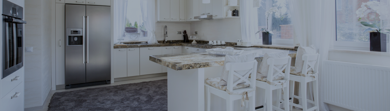 Kitchen with White Cabinets and Stainless Steel Appliances
