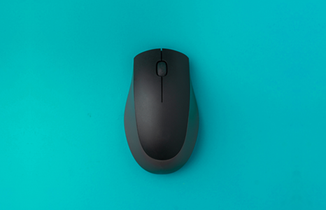 Wireless Computer Mouse on Turquoise Background