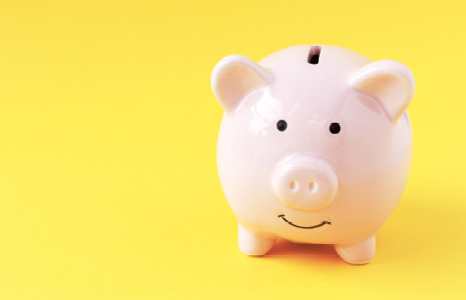 Piggy Bank on Yellow Background