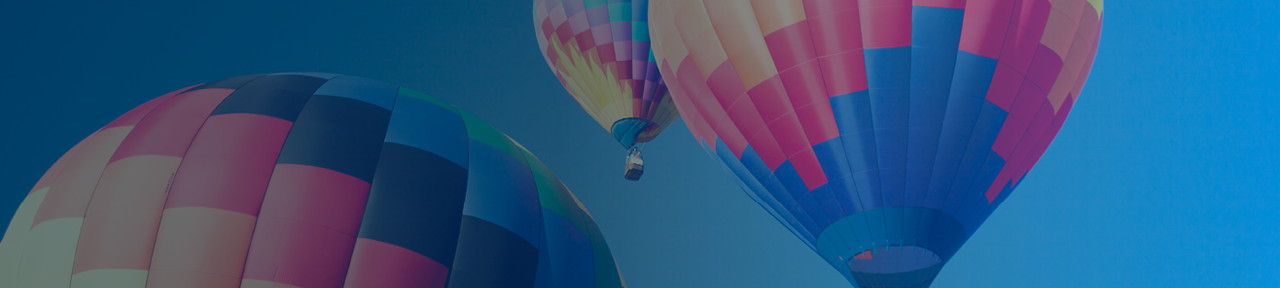 Three Hot Air Balloons in the Sky