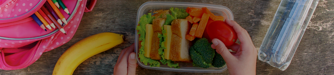 Student Eating Healthy Lunch at School