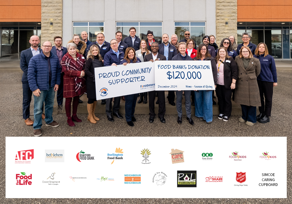 FirstOntario Blue Wave volunteers holding 2024 cheque donation for food banks