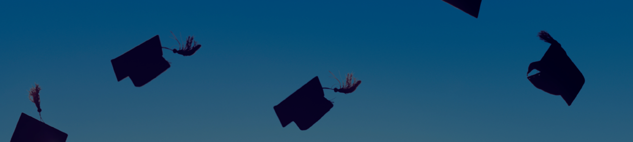Graduation Caps tossed in the air