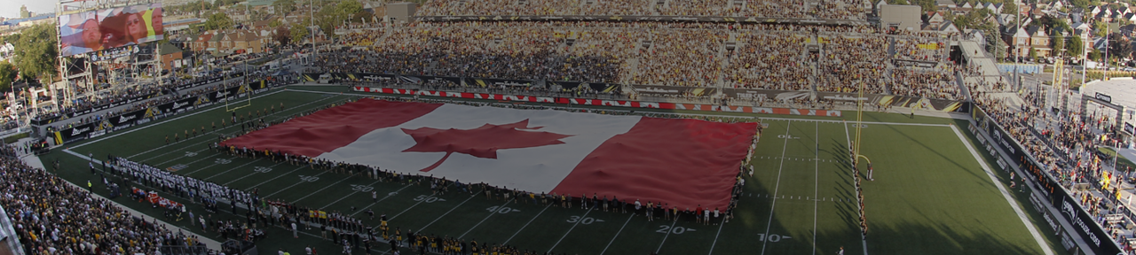 Giant Canadian Flag Spread Across Tim Hortons Field