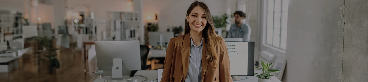Business Owner Smiling In Office Space