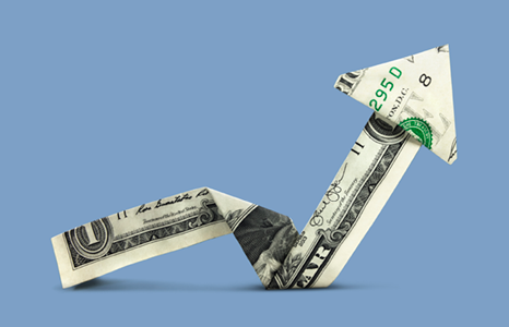 U.S. Dollar Bill Folded into Upward Trending Arrow