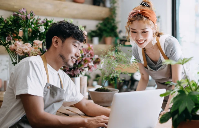 Coworkers Working at Desks in Office