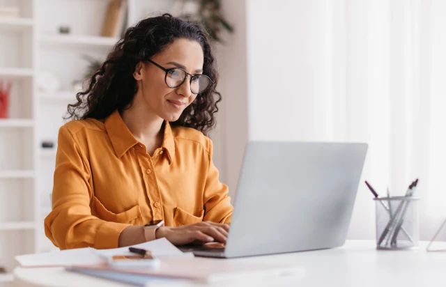 Two Women Viewing Business Account at Lunch Meeting