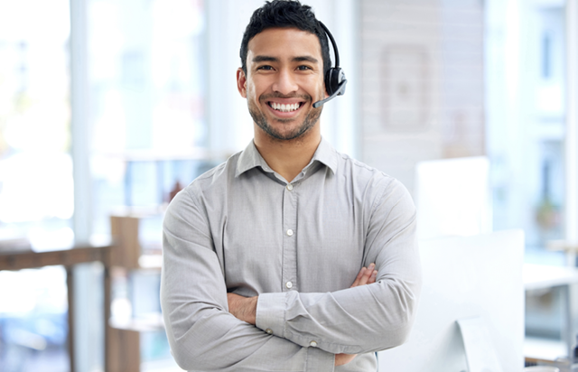 Support Agent with Bluetooth Headset Smiling