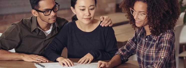 Couple meeting with financial advisor to discuss RRSPs