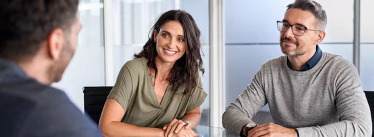 Couple discussing Tax Free Savings Account with a wealth advisor