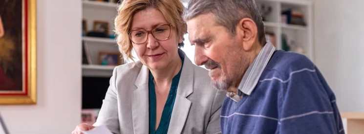 Couple reviewing their will at kitchen table