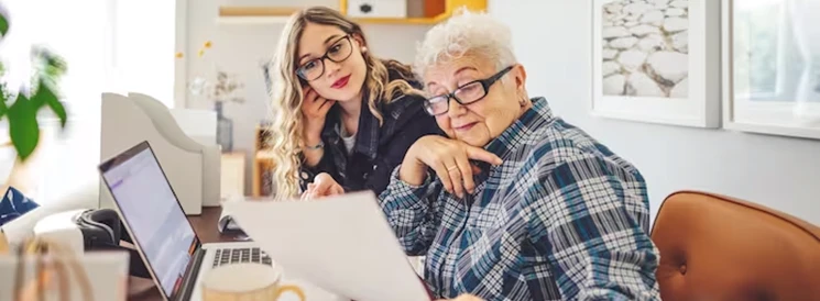 Two women working together on power of attorney documents