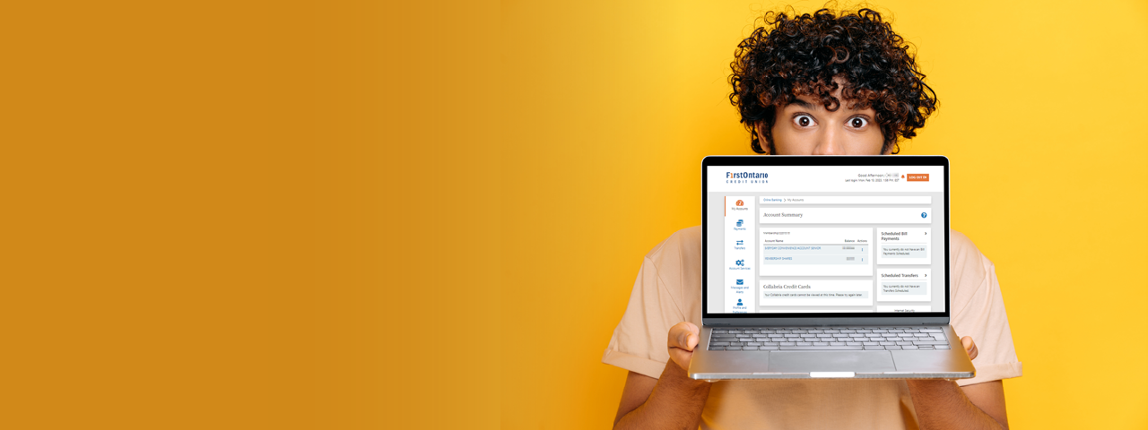 Person Holding Laptop Open to FirstOntario's New Online Banking