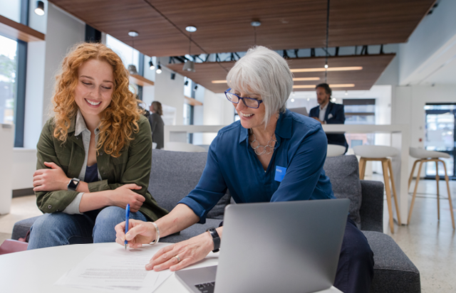 Two People Working Together on Financial Plan