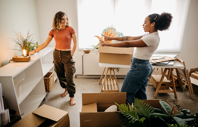 Two Student Discussing Apartment Layout