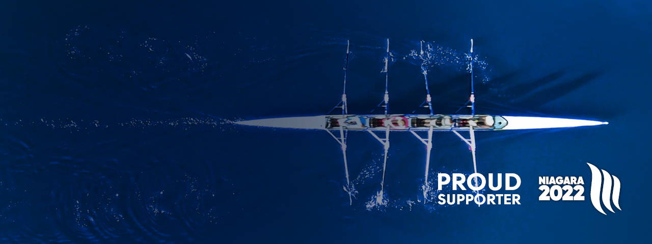 Proud supporter of Niagara 2022, Pictured: A birds eyes view of a rowing team on blue water