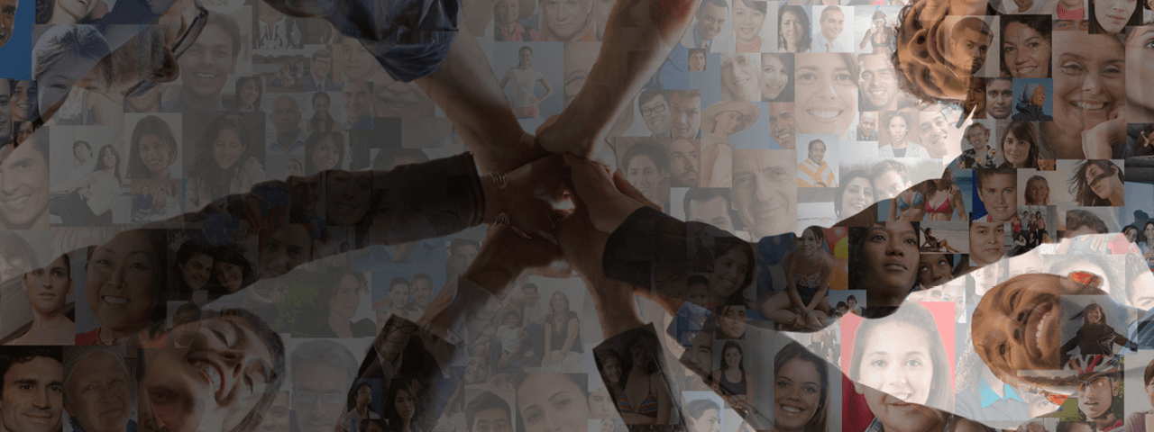 Group of People With Hands in a Circle