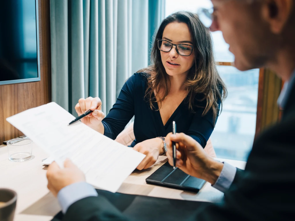 Person meeting with mortgage advisor to discuss conventional mortgage at FirstOntario Credit Union