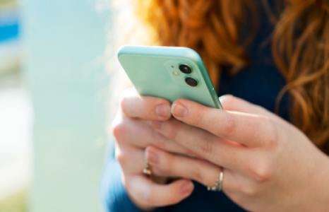 Person Holding Mobile Phone for 2-Step Verification