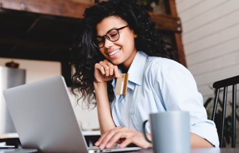 Woman Smiling While Viewing Collabria Welcome Points Offer
