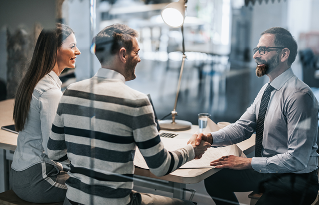 Couple Meeting with Financial Advisor to Discuss RRSP Mutual Funds