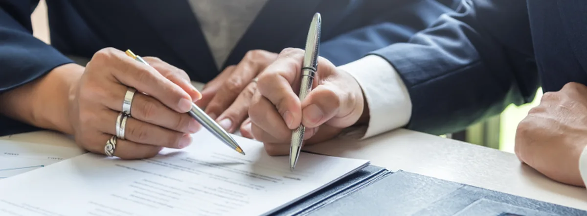 Two people reviewing estate plan