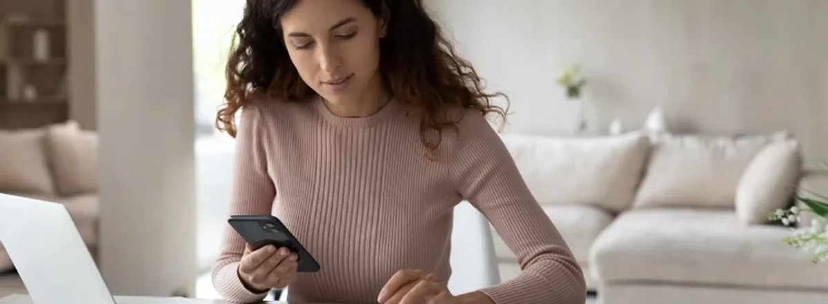 Woman reviewing income information to create budget