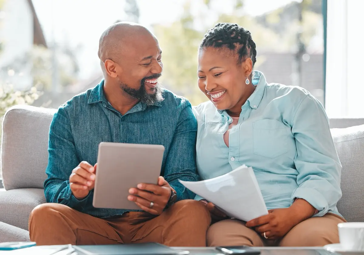 A mature couple discussing investment options.