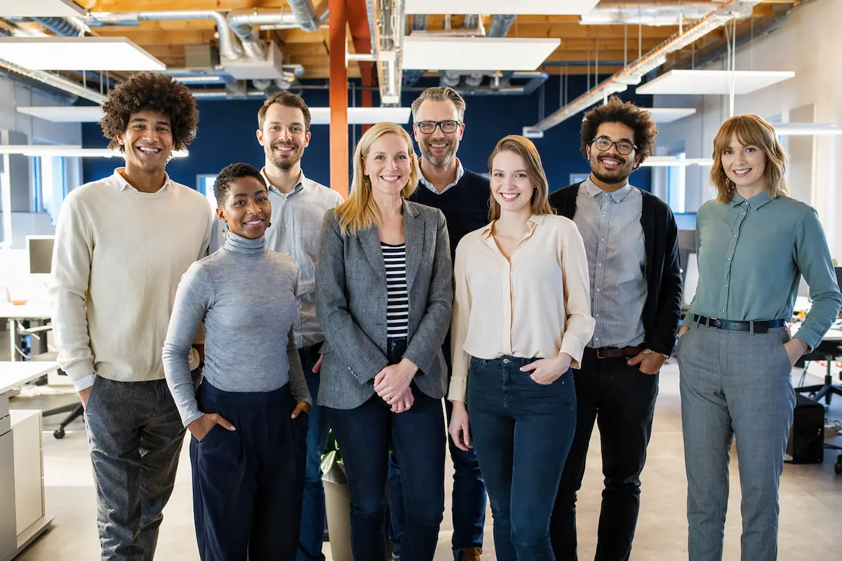 Group of Colleagues Posing for a Group Picture in Office