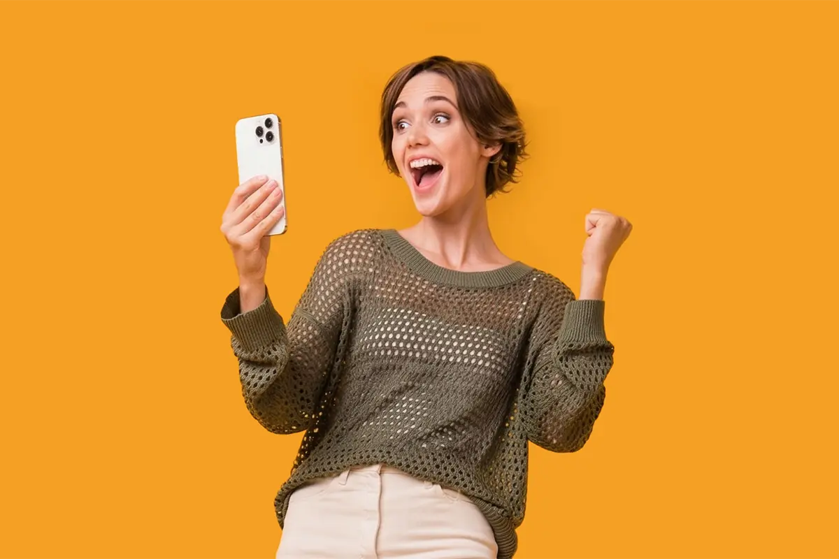 Woman jumping for joy after earning a cash bonus with FirstOntario Investments.