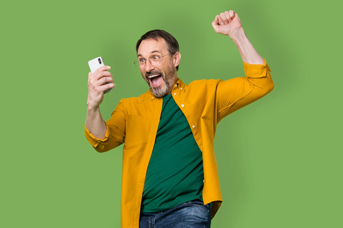 Earn cash with FirstOntario Investments. Man jumping for joy after earning a cash bonus with FirstOntario Investments.