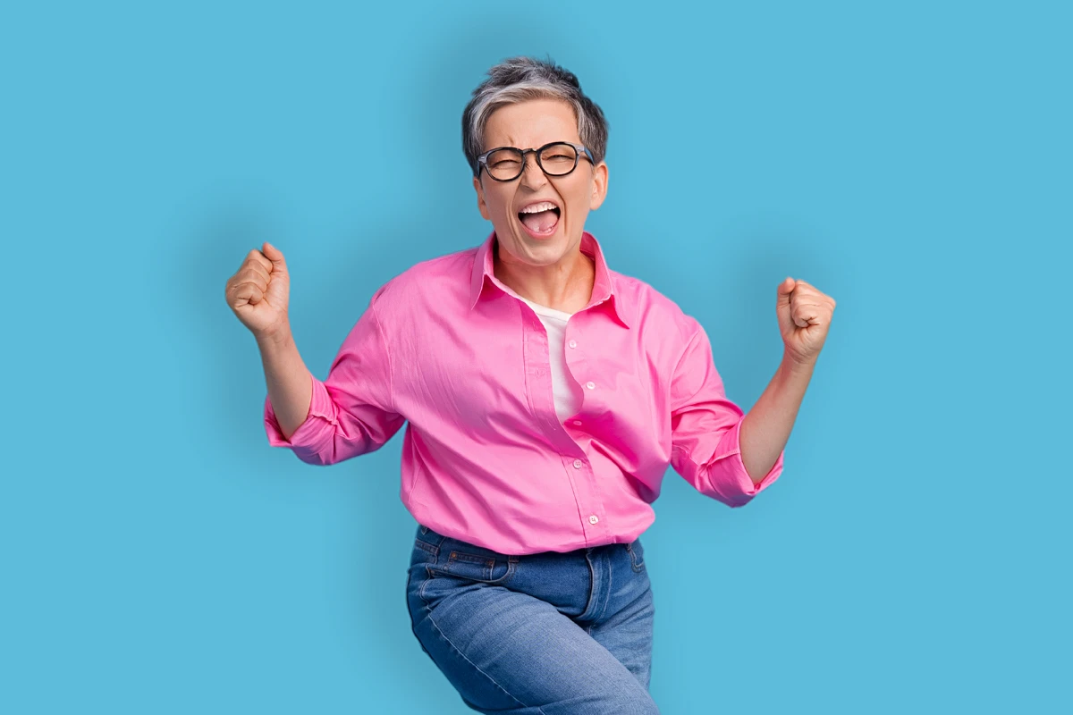 Woman in pink shirt jumping for joy after earning a cash bonus with FirstOntario Investments. Woman in pink shirt jumping for joy after earning a cash bonus with FirstOntario Investments.