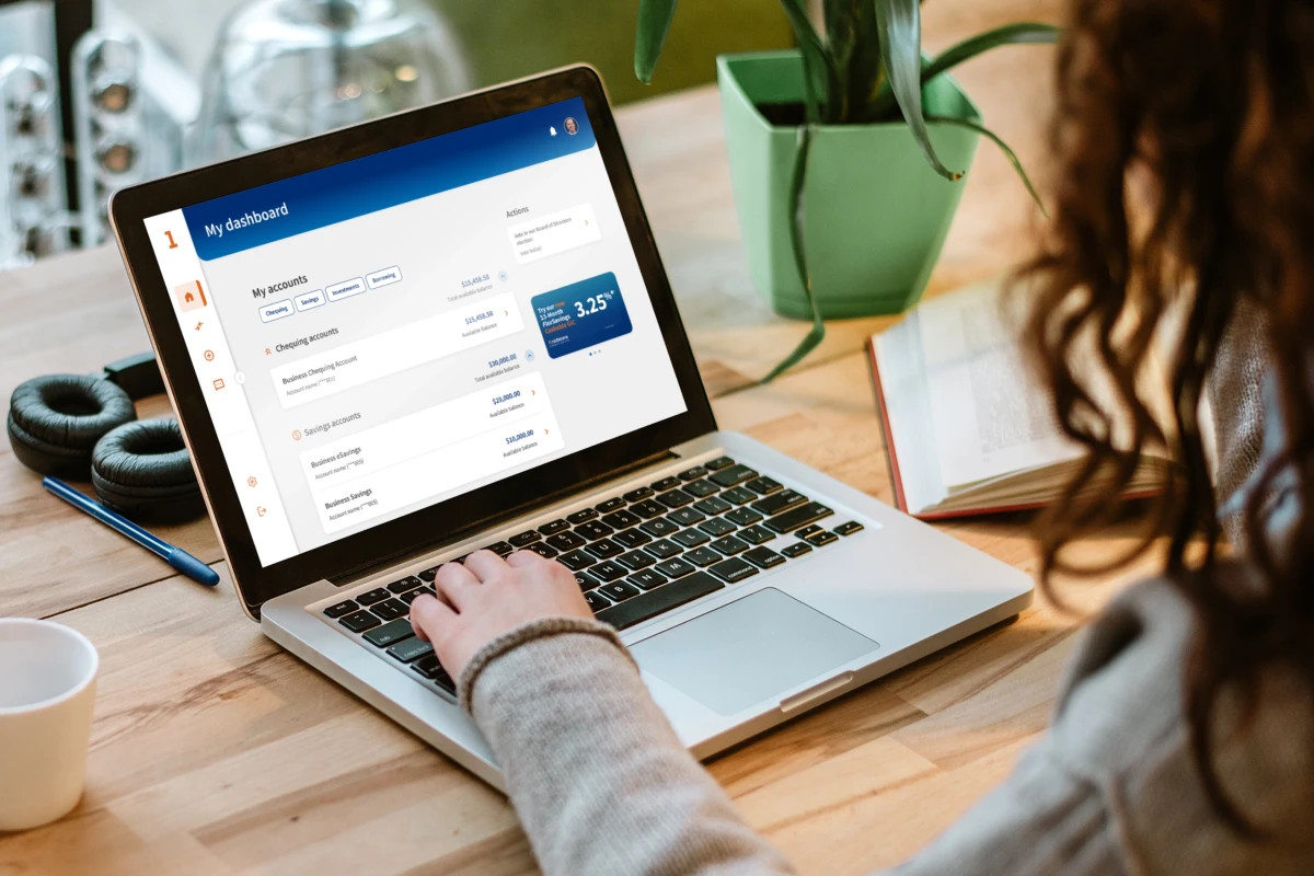 Person using FirstOntario's new online banking experience on laptop Person using FirstOntario's new online banking experience on laptop